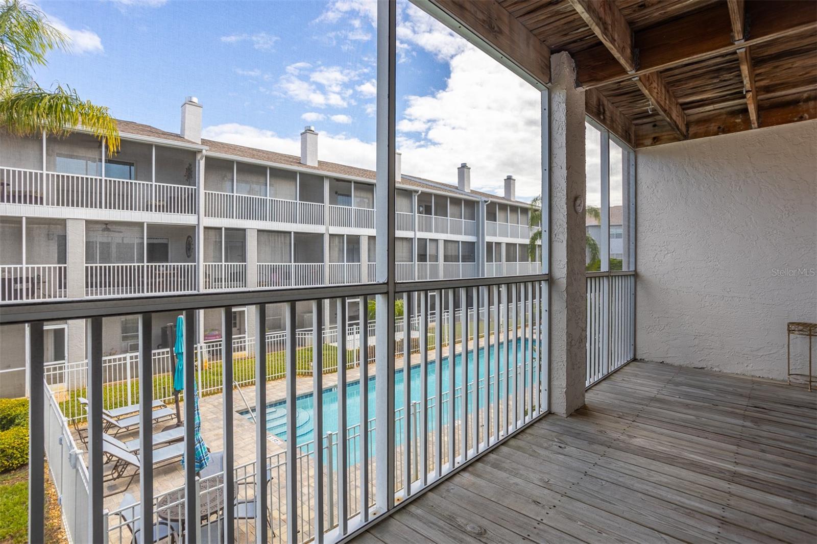 Poolside Balcony off of Living Rm