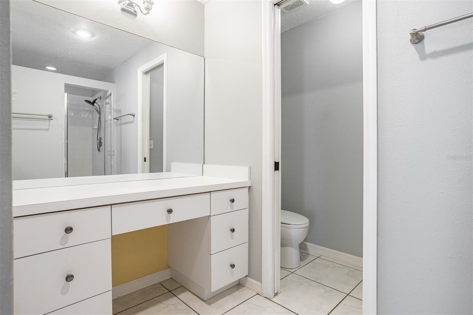 Separate Vanity/Makeup Area & private water closet