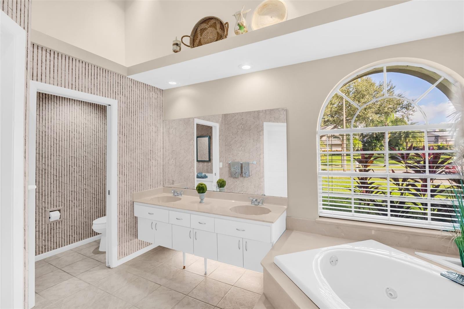 Soaker tub, separate walk-in shower, private toilet & oversized walk-in closet~