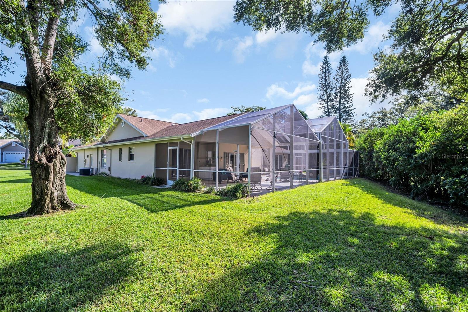 Nearly 1/2 acre lot offering plenty of privacy~