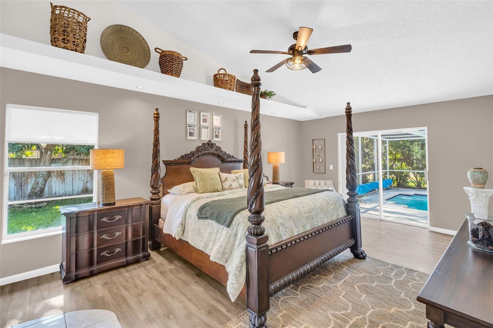 Oversized master oasis with large slider access to heated pool~