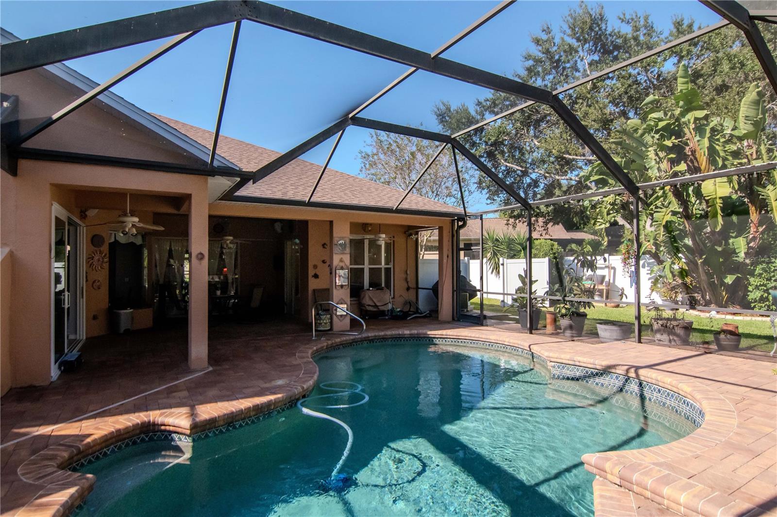 A true backyard oasis! Plumbed for summer kitchen