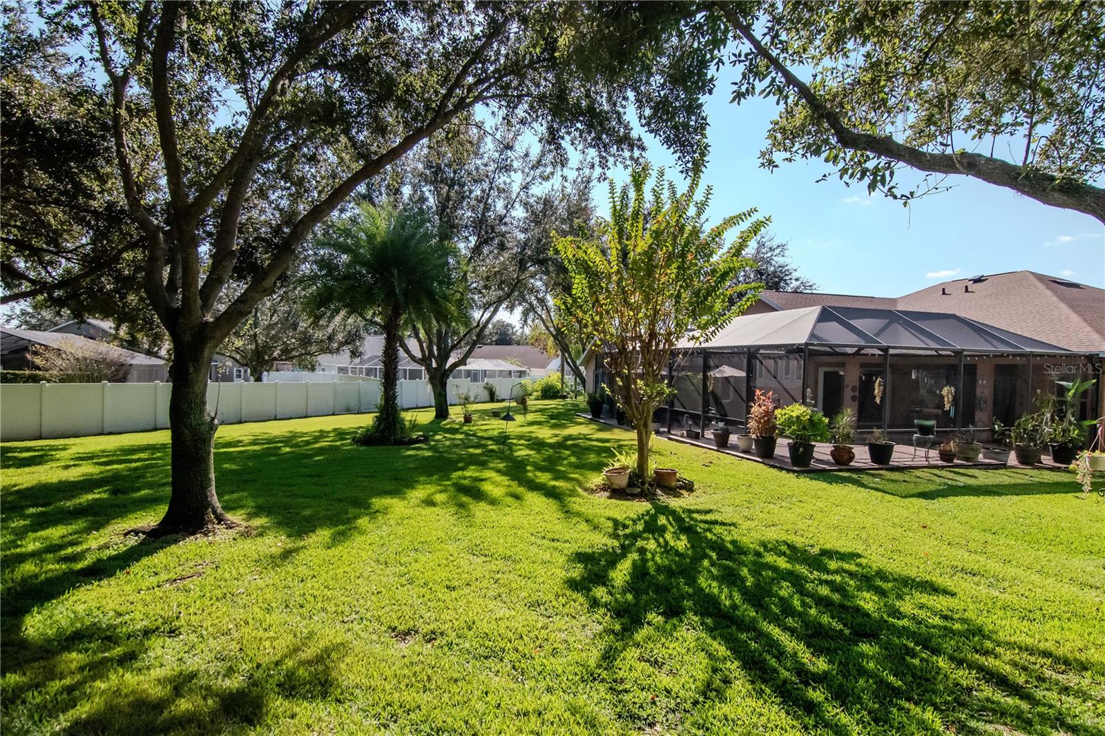 A true backyard oasis! 0.40 acres with lush landscaping and privacy