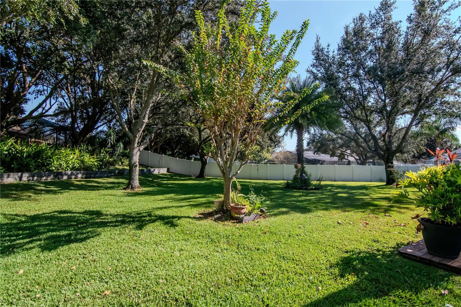 A true backyard oasis! 0.40 acres with lush landscaping and privacy