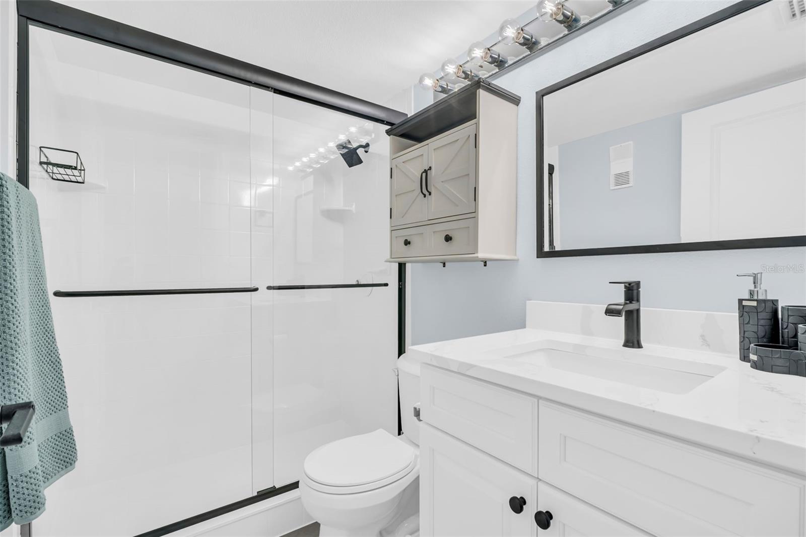 Fully renovated bathroom #1 just off the primary bedroom