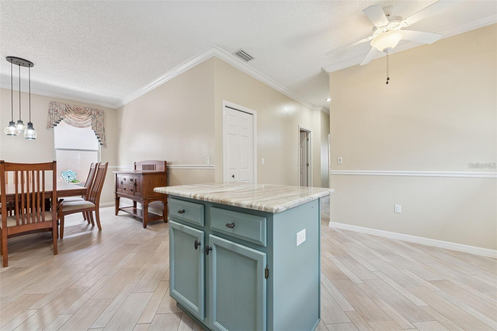 Kitchen view looking out towards dining room and eat-in kitchen area