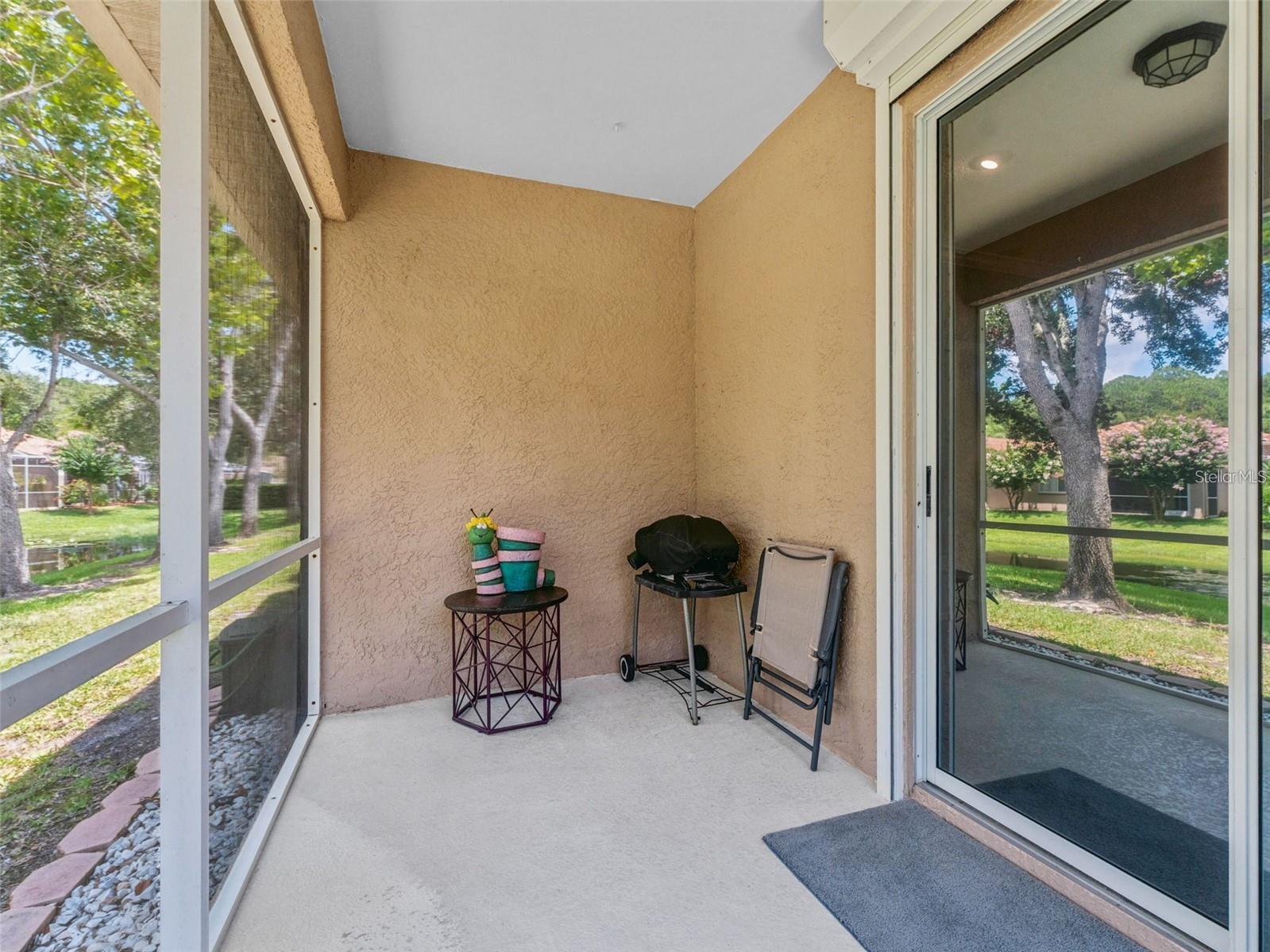 Large back patio with room for all your outdoor furniture