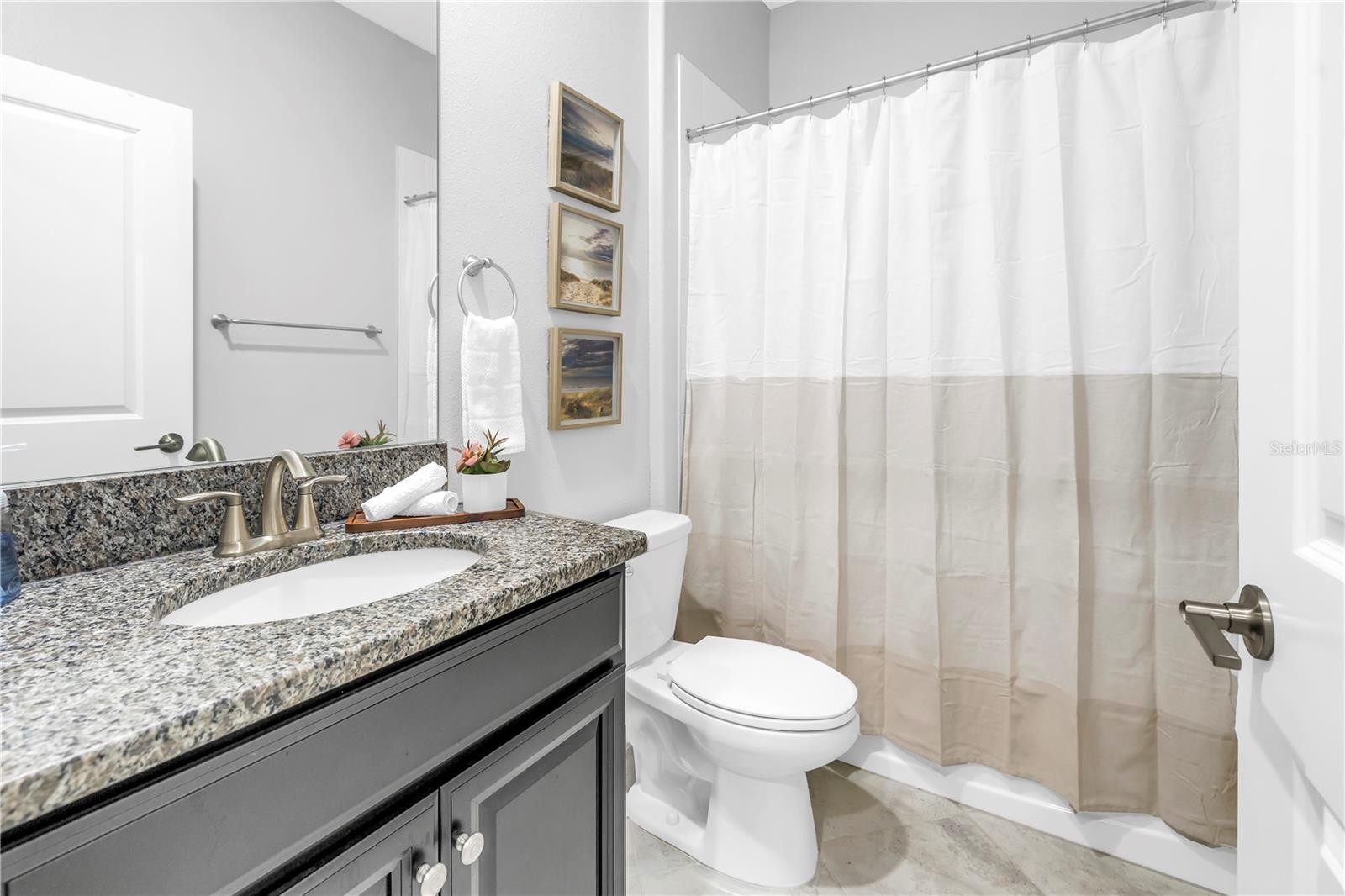 Bathroom 3: Immediately next to the 4th Bedroom or Office