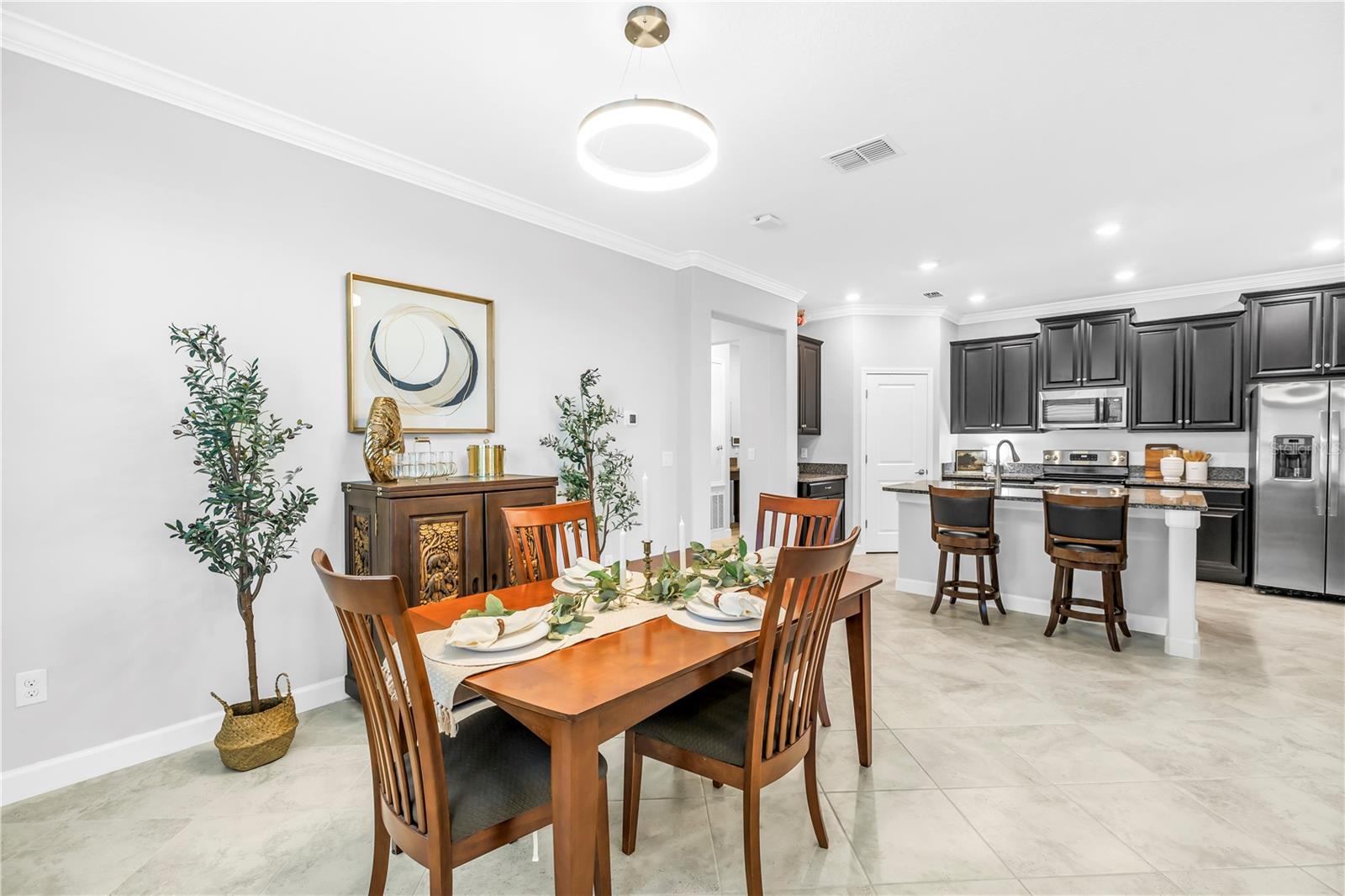 Kitchen and Dining combination as you enter the main living space from the hallway