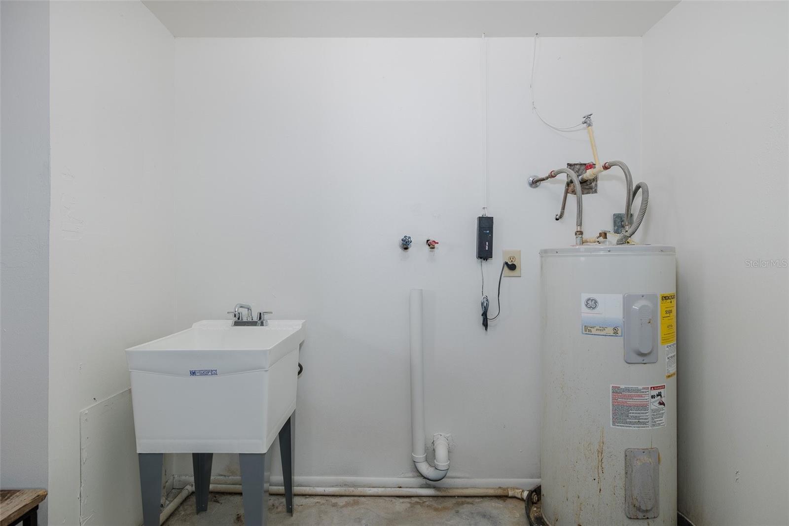 Laundry Area with Utility Sink