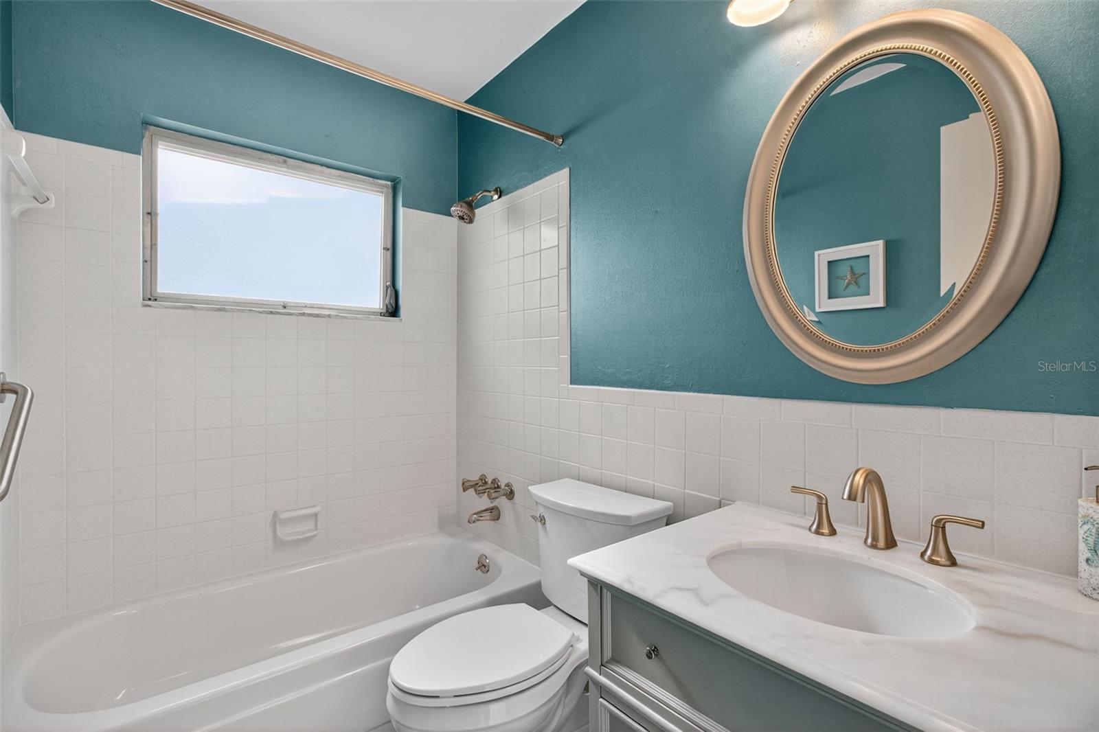 Guest Bath with newer: vanity, toilet, luxury vinyl flooring