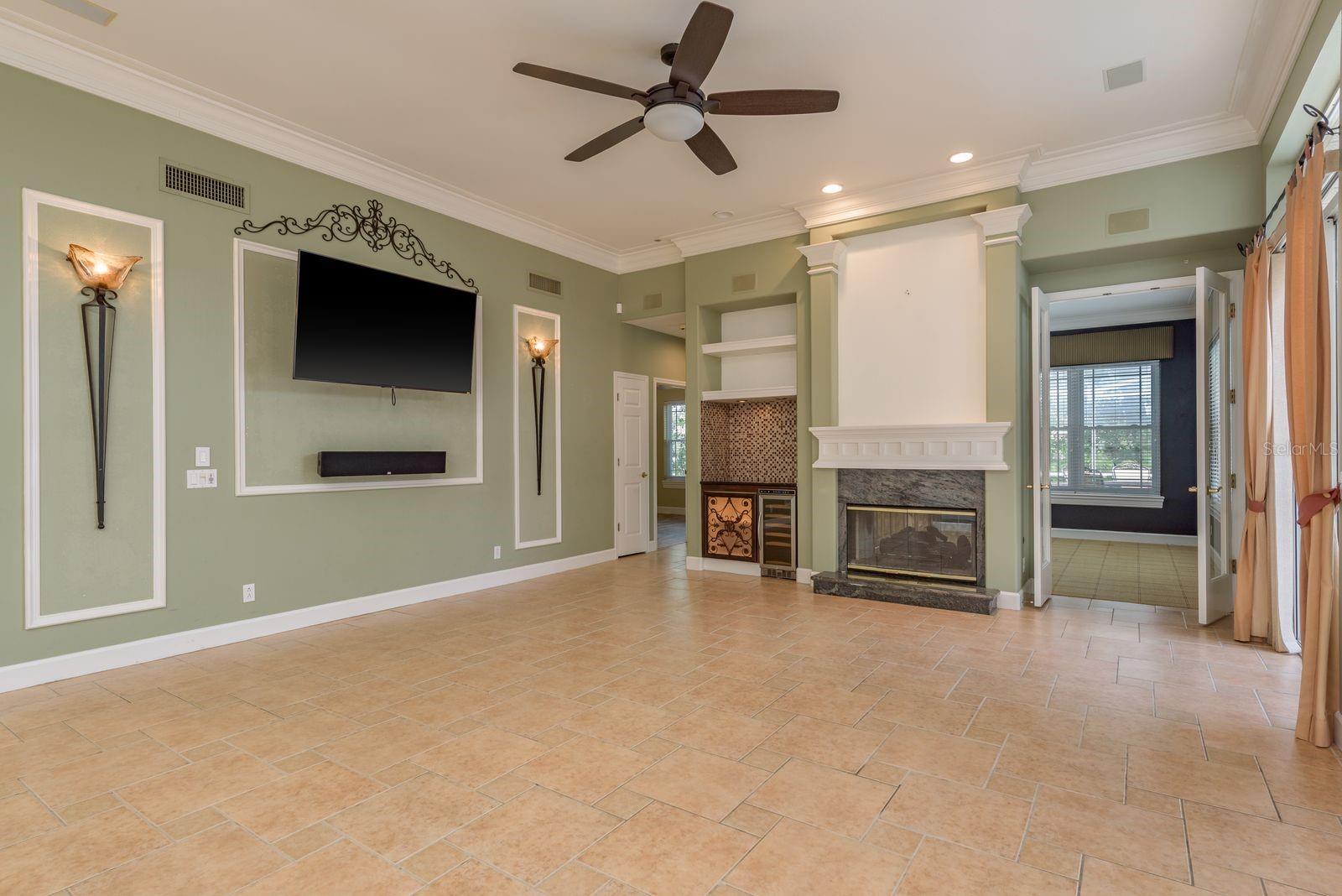 Pass through fireplace to private office