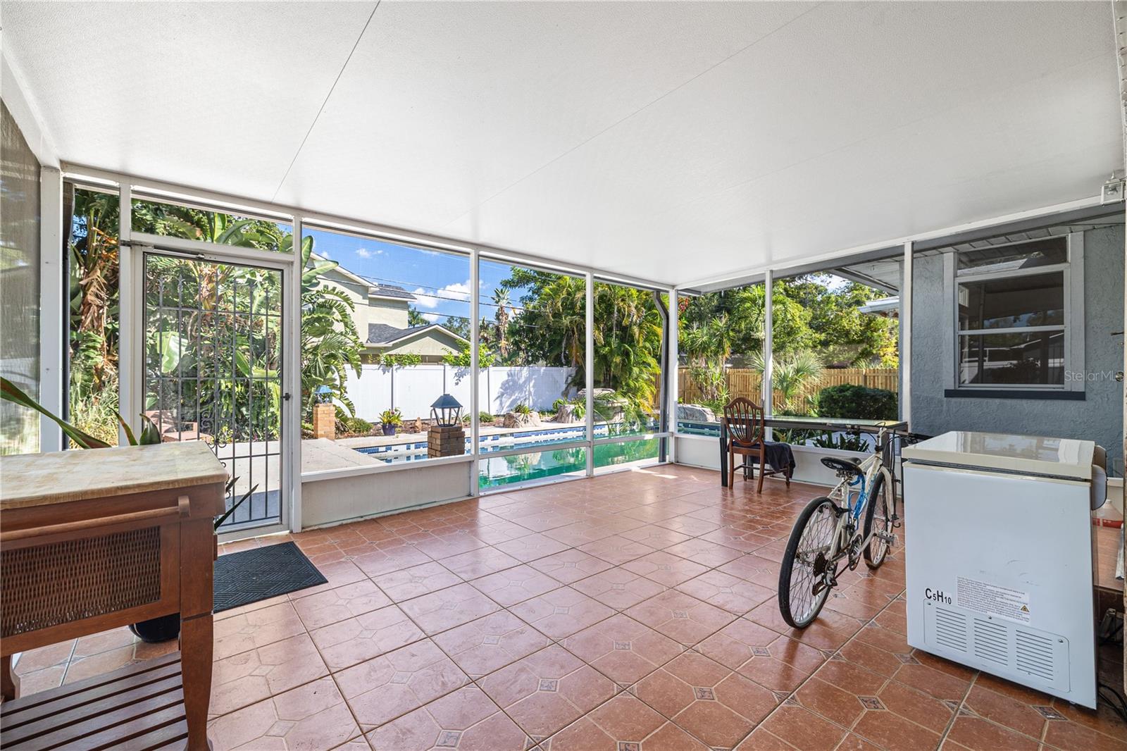 Rear screened patio offers plenty of room to relax and take in the views.