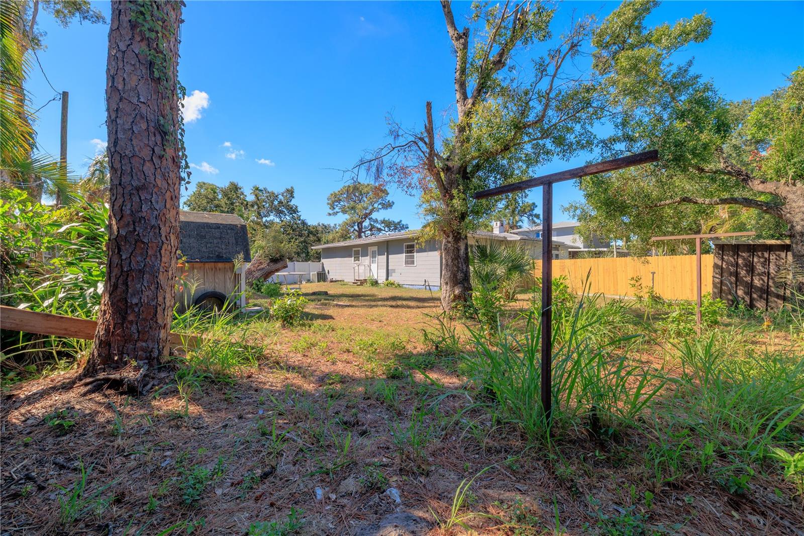 The pool is just on the other side of the fence. Bring your imagination... the possibilities are endless.