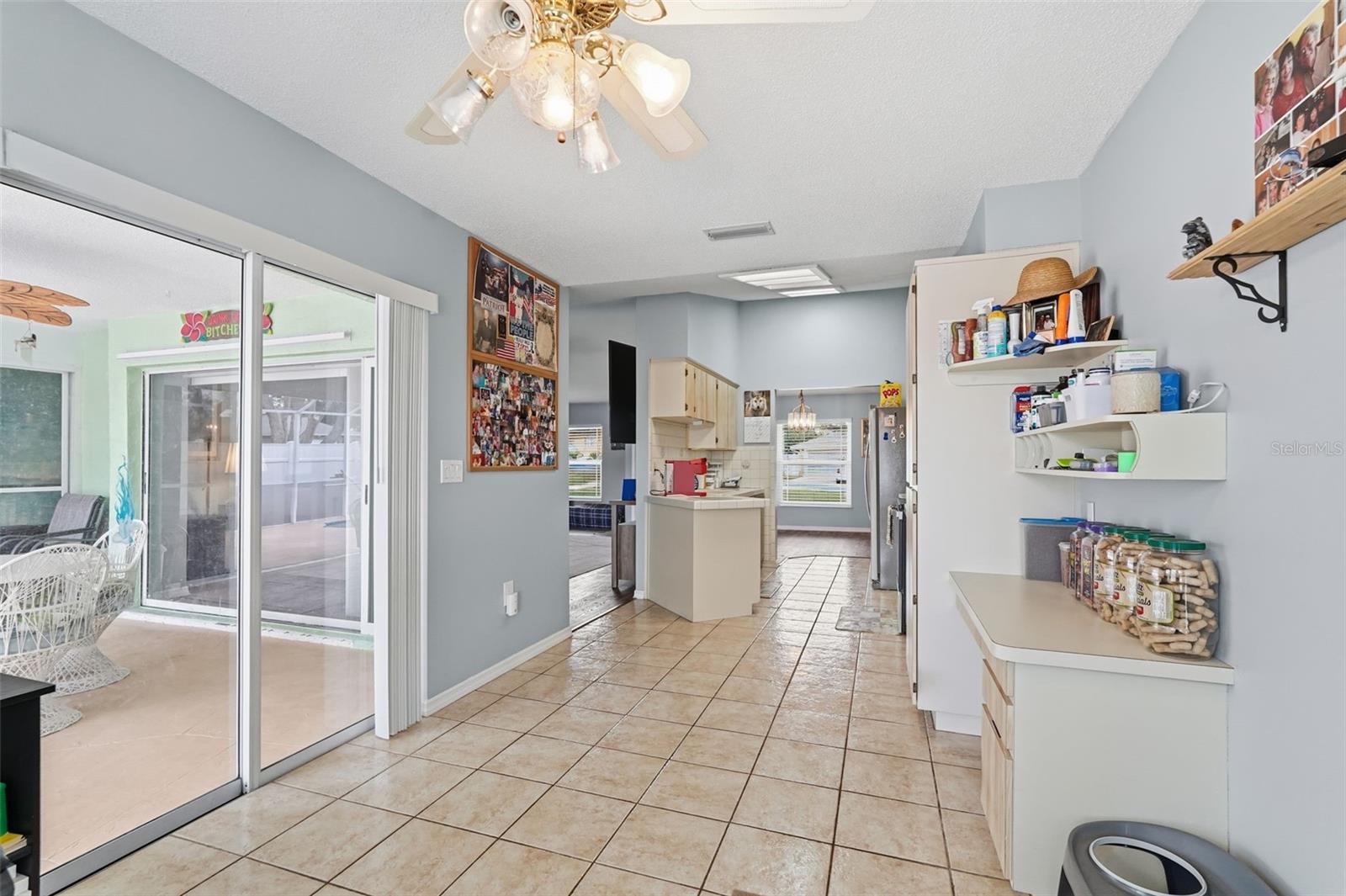 Breakfast nook looking out to the pool and into the kitchen
