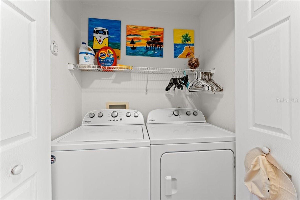Laundry closet conveniently located in the unit with full size washer & dryer. No mini size, small condo or  stackable units for you in this home