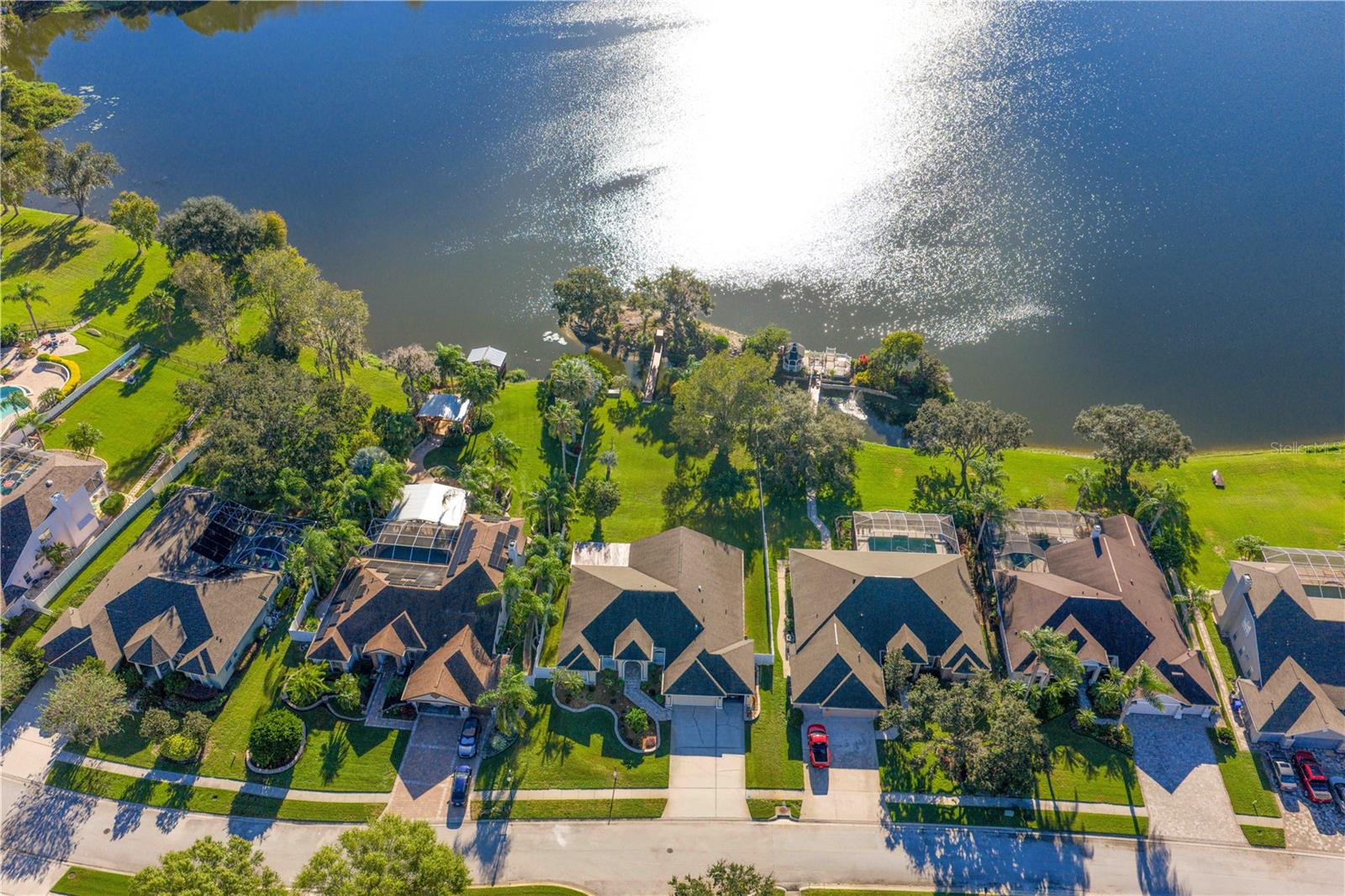 Full property view — home, lake, and island included.