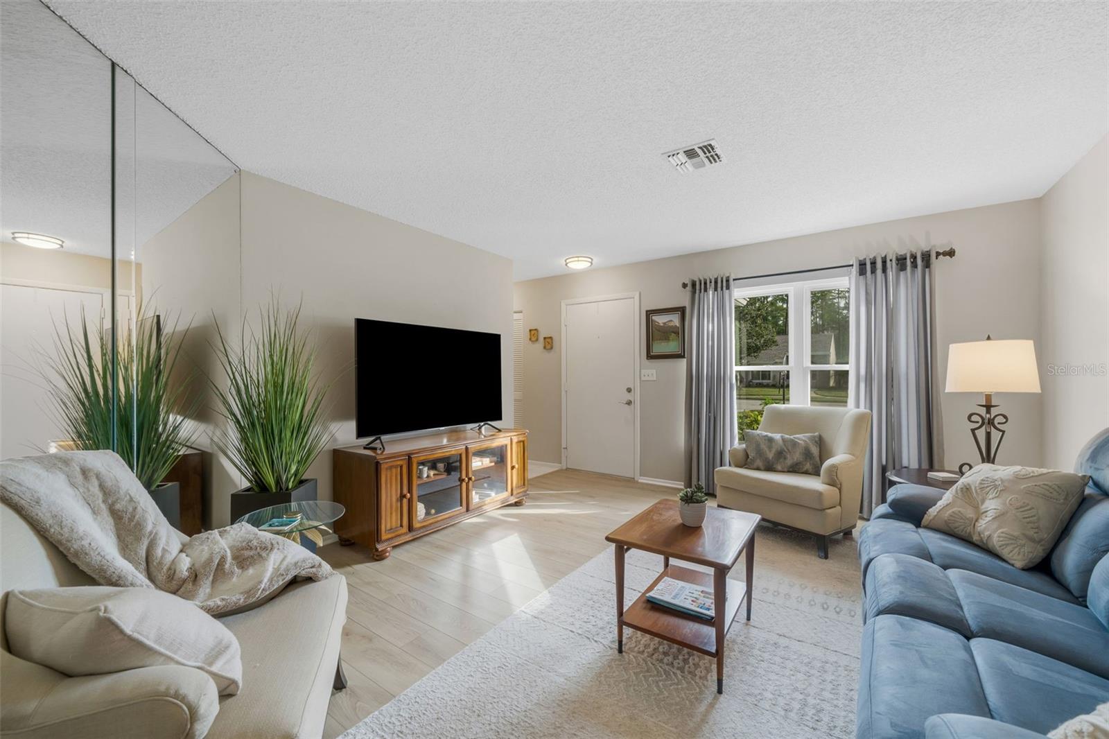 Hallway left of front door there's a convenient COAT CLOSET!