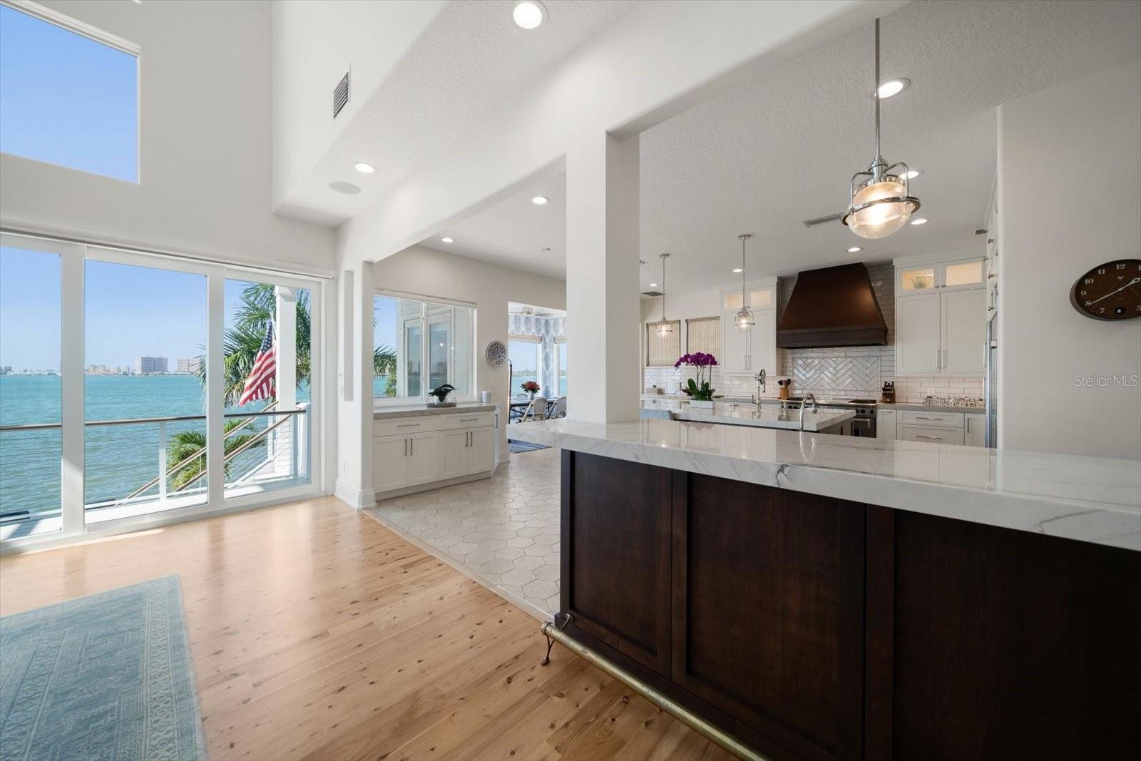 Chef friendly gourmet kitchen with new quarts countertops, designer faucet, cherrywood cabinets and high end appliances