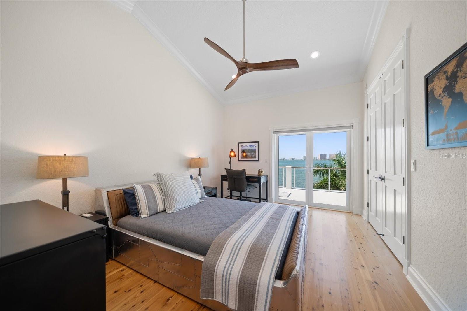 4th bedroom with French doors to the balcony and a custom closet