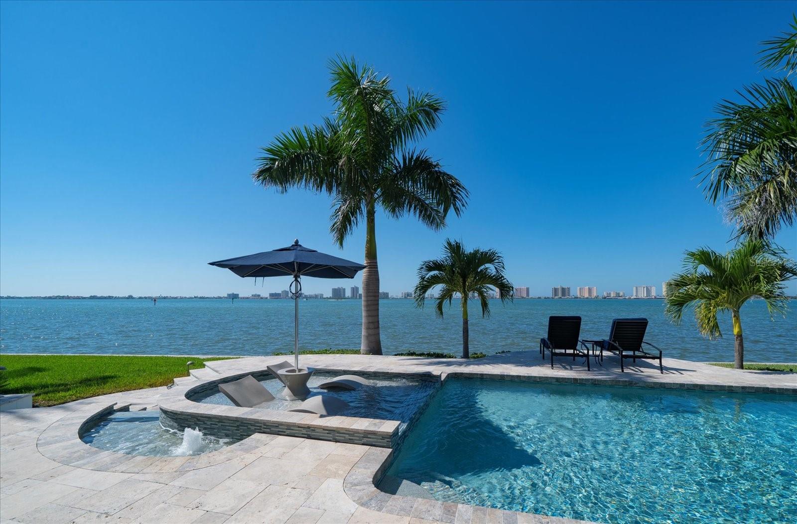 Saltwater pool with travertine deck
