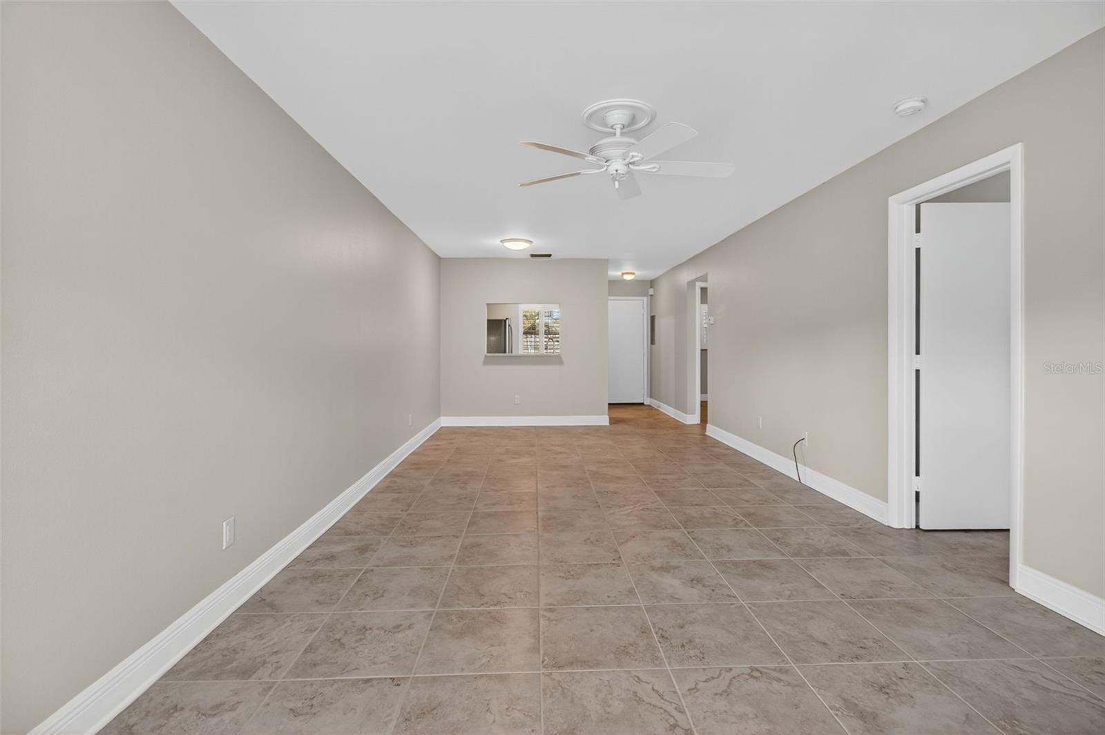 Living / Dining Room / Door to Primary Bedroom