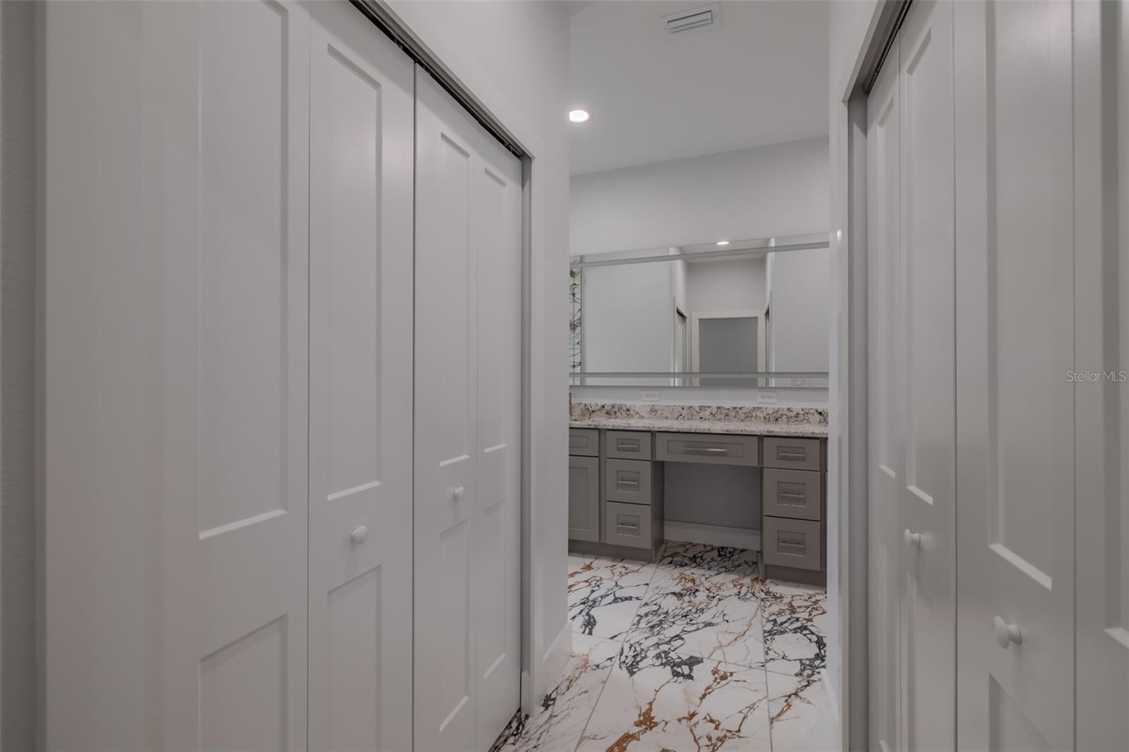 Two closets in the primary bedroom