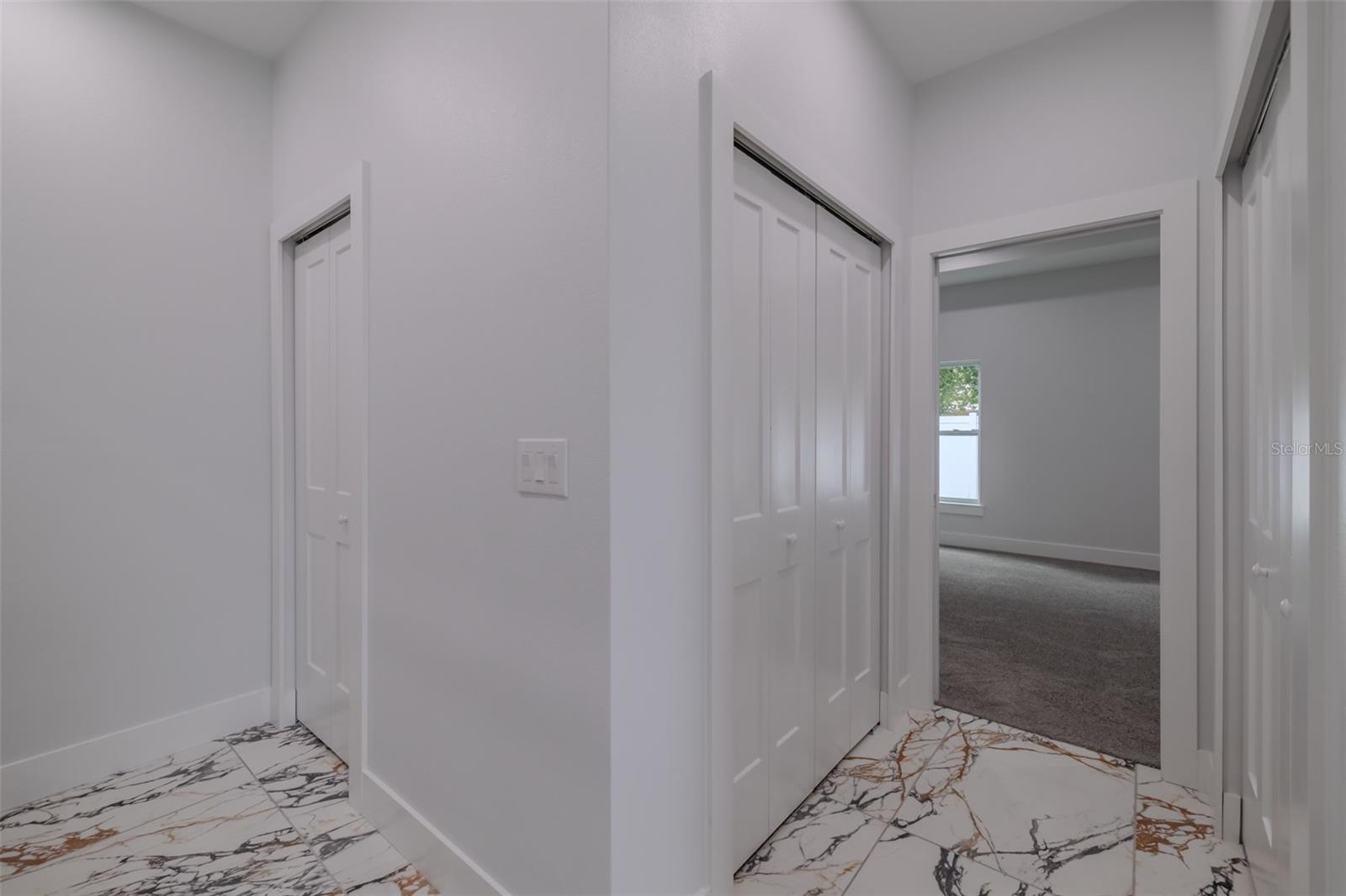 toilet with door in the master bath