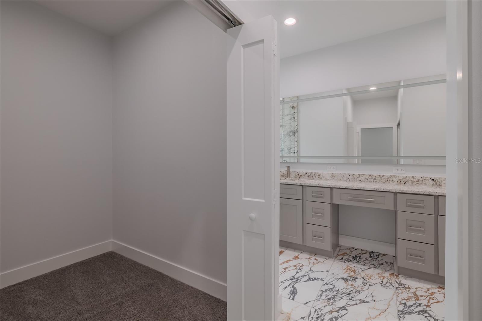 one closet looking into the bathroom