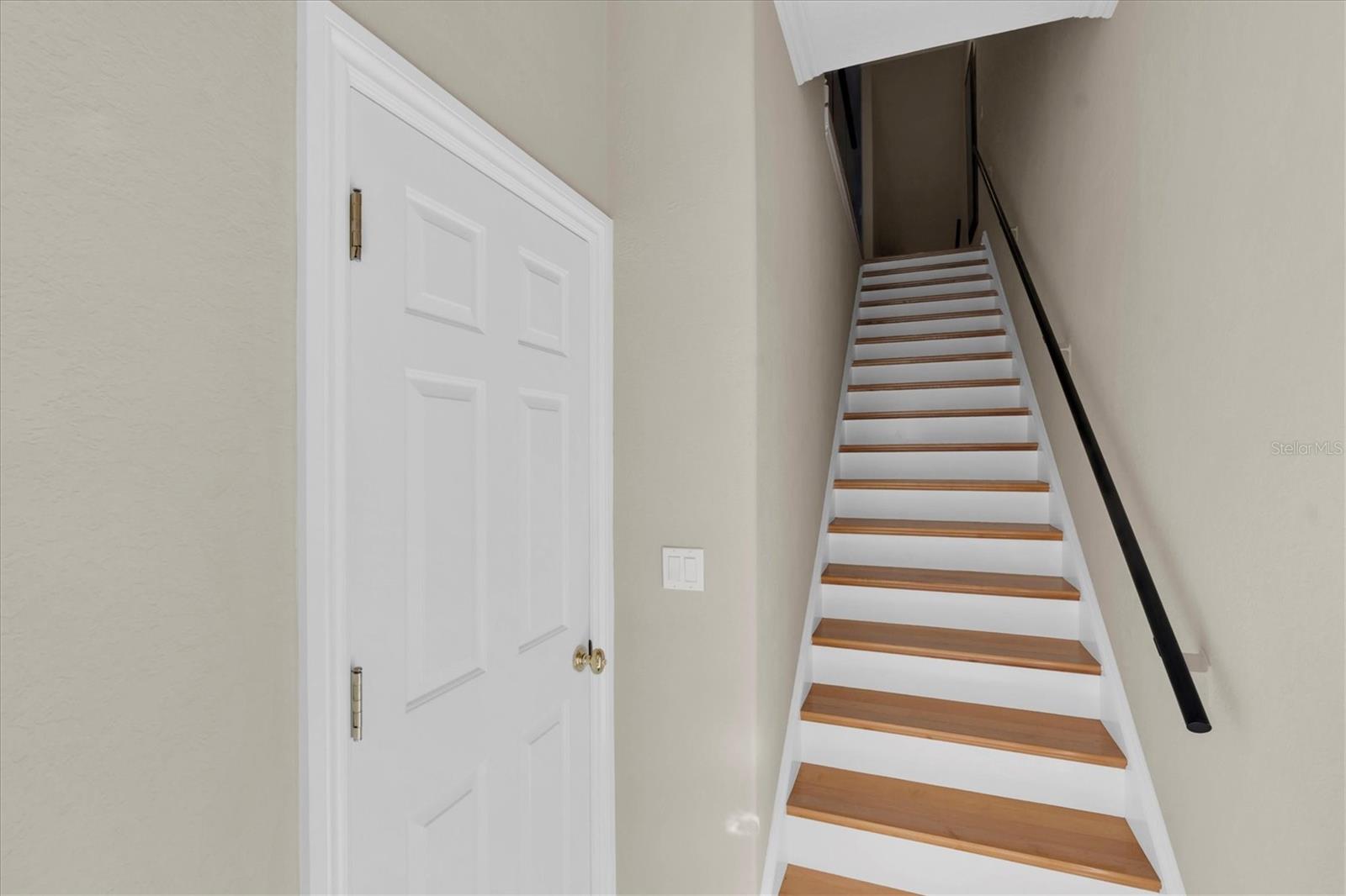 staircase down to family area & garage level