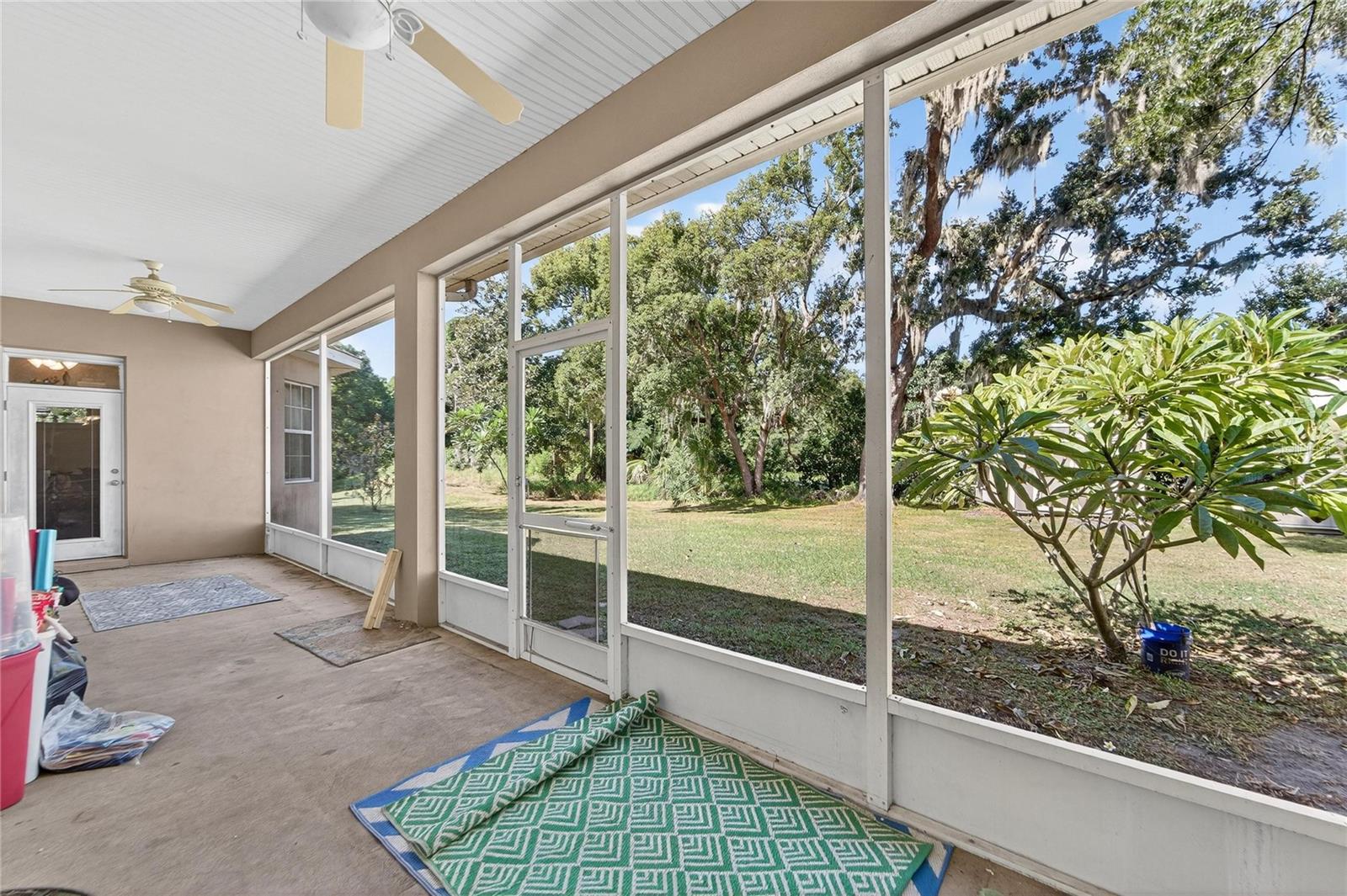 Back screened-in and covered porch at 332 Holloway Rd, Plant City