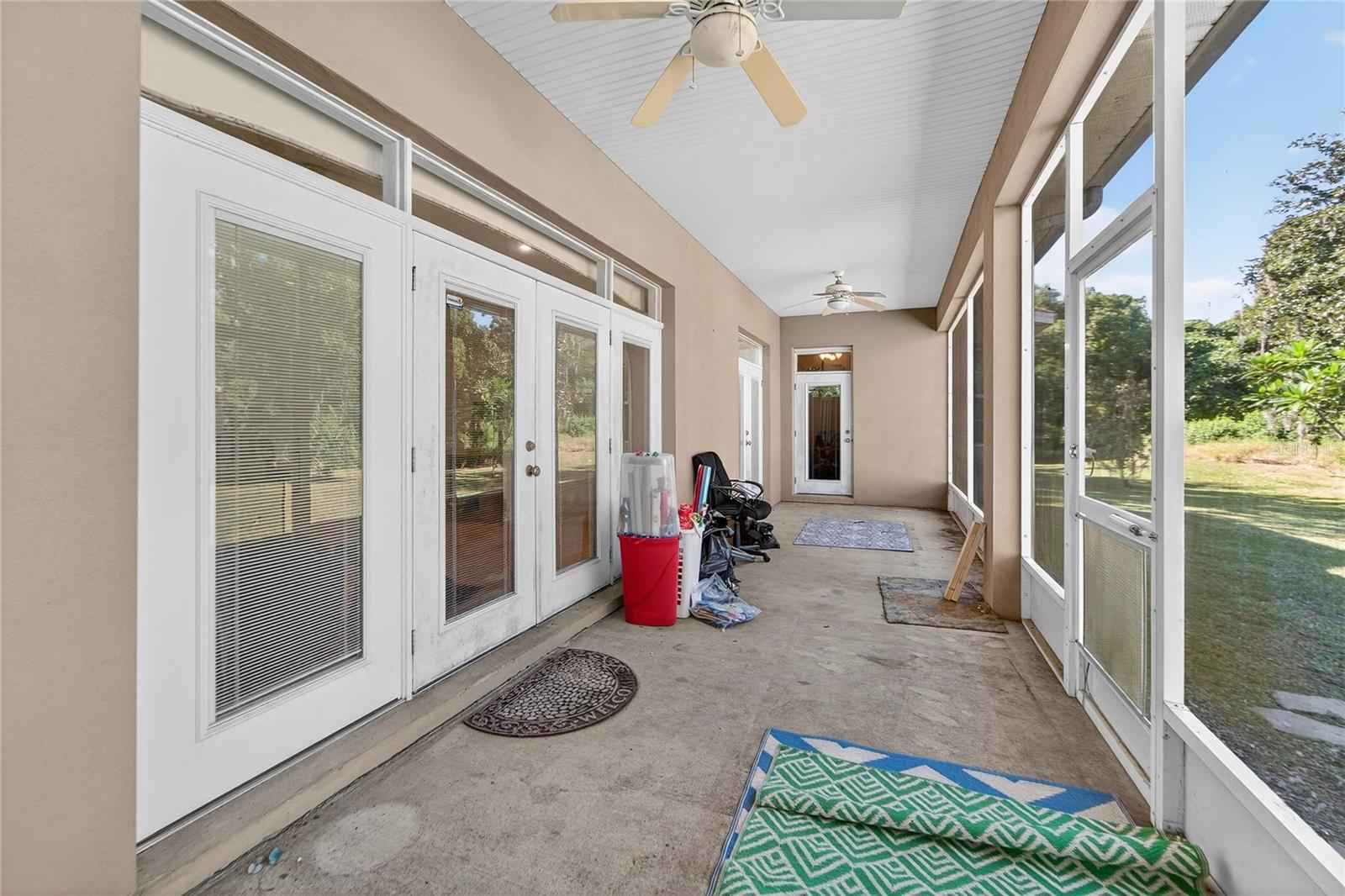 Back screened-in and covered porch at 332 Holloway Rd, Plant City