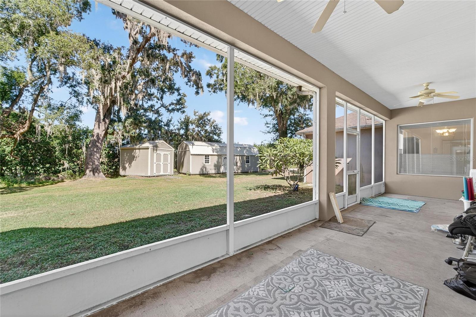 Back screened-in and covered porch at 332 Holloway Rd, Plant City