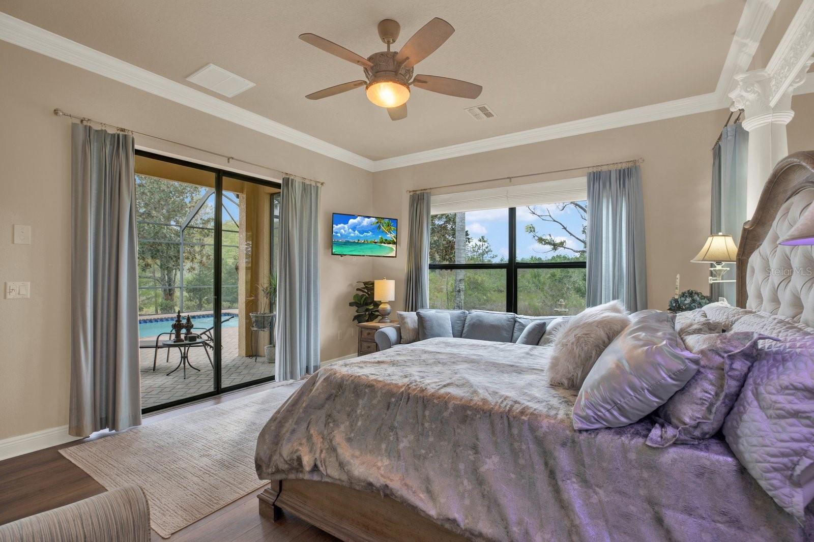 Expansive master retreat offering ample space for lounging.
