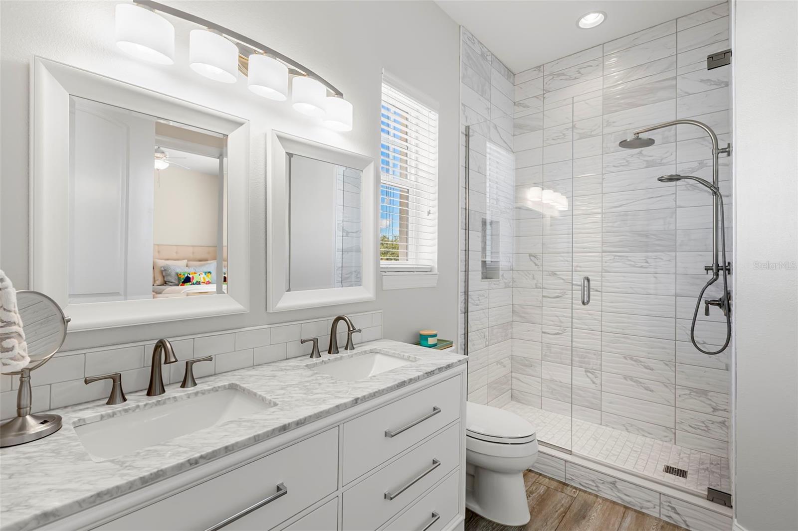 Jack-n-Jill Bath between Bedroom 2 and 3, completely remodeled.