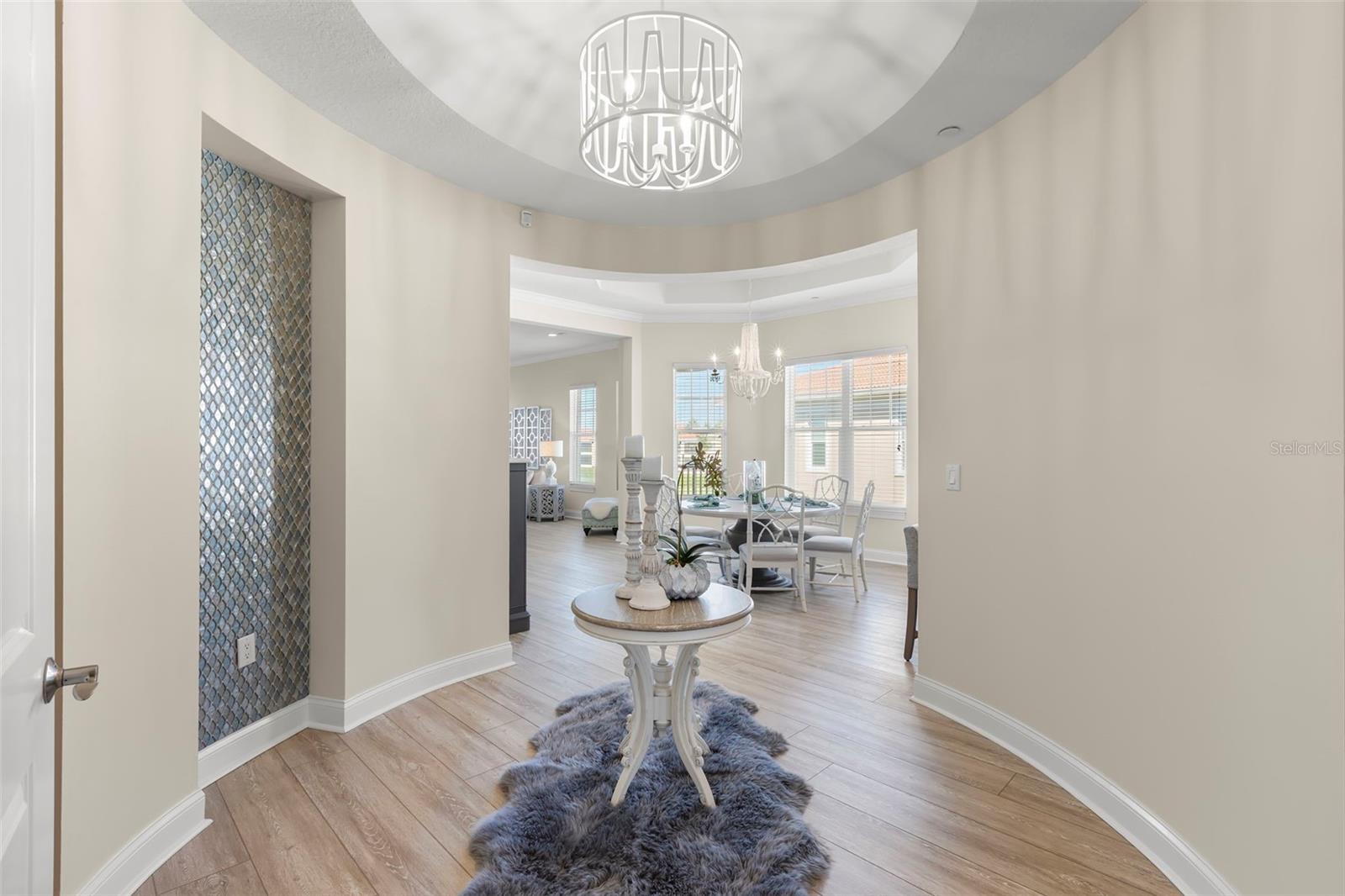 The elegant entry rotunda leads to all other rooms.