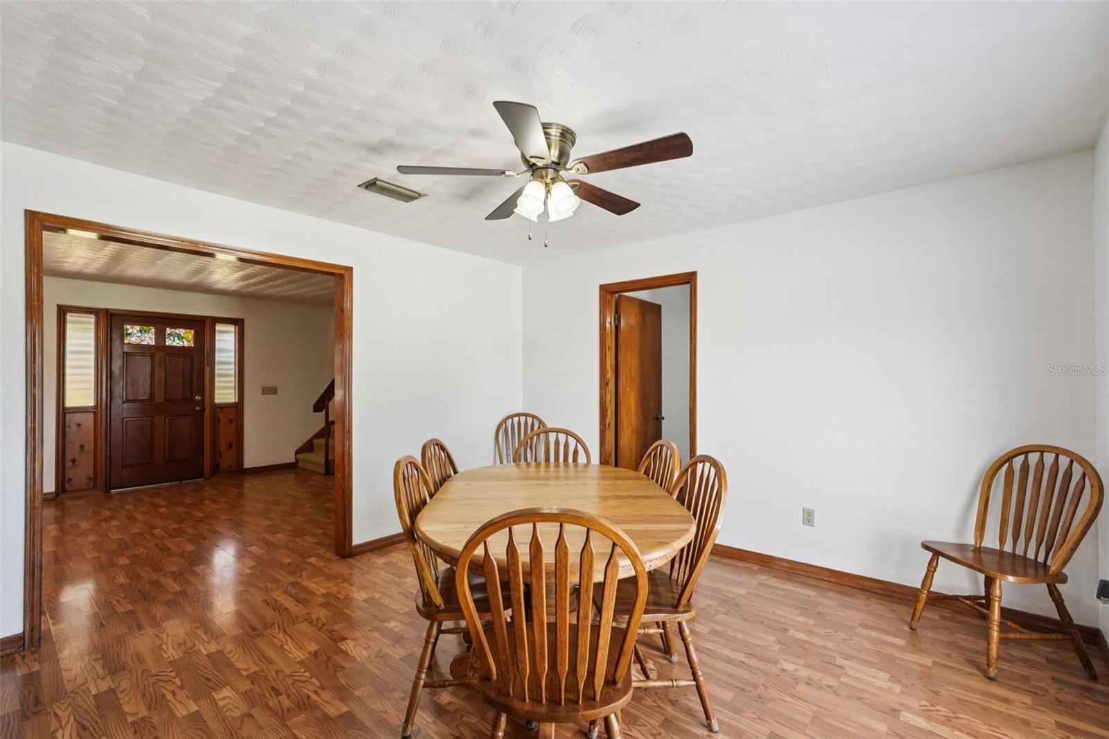 Dining room off of living room & inside door to home office