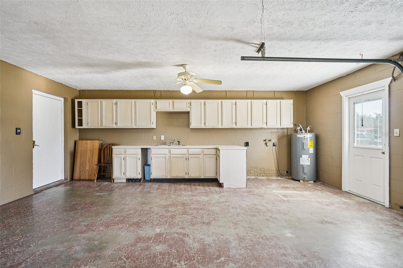 2-car garage with storage cabinets