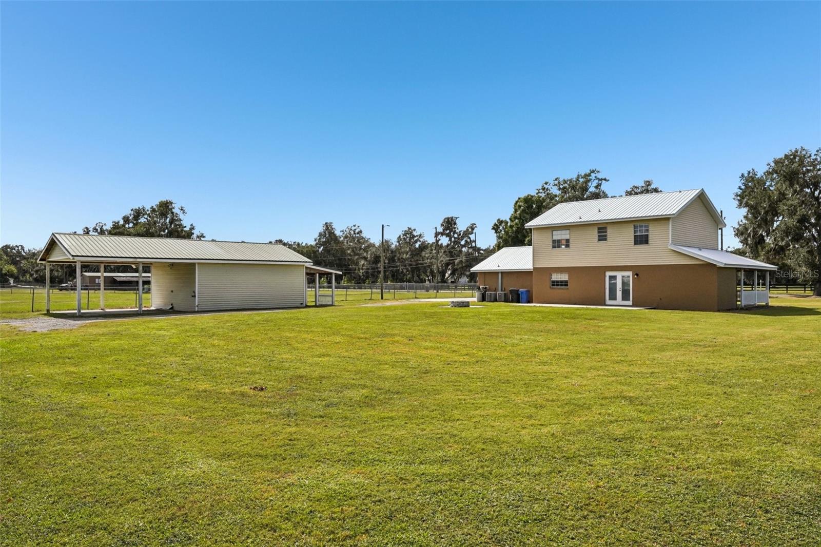 NE corner of property showing home & Out-building #1