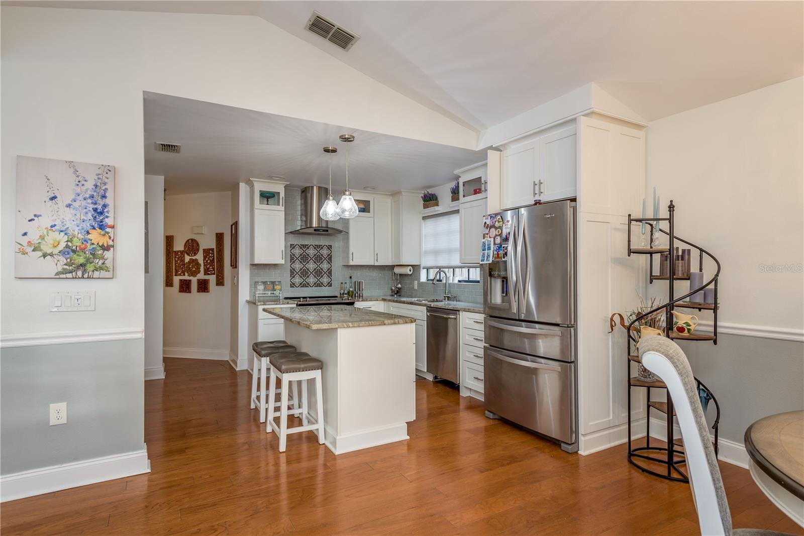 Tastefully updated with flex space for any chef