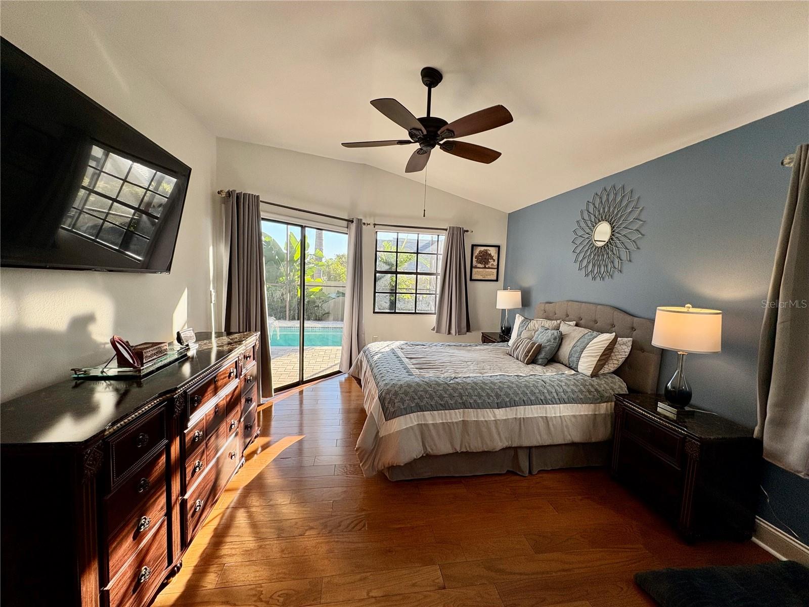 Huge Primary bedroom with sliders to pool