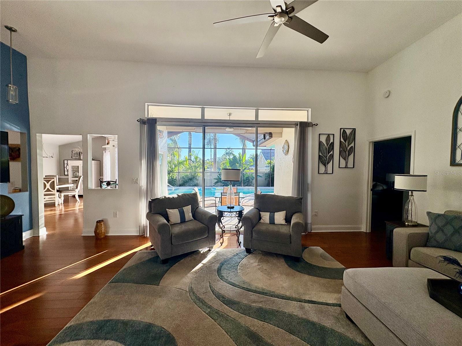 Living room with Pool side view