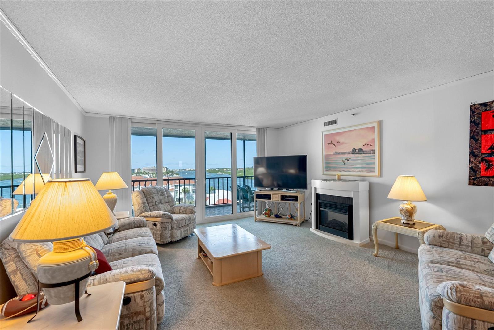 .. PH Top Floor Unit # 611 Enjoys Privacy & Long Range Water Views for Miles. Large 2 Bedroom 2 Bath  With Spacious 28' X 15' Great Room.  New Impact Sliders + New Storm Shutters + New Windows + New Flooring.