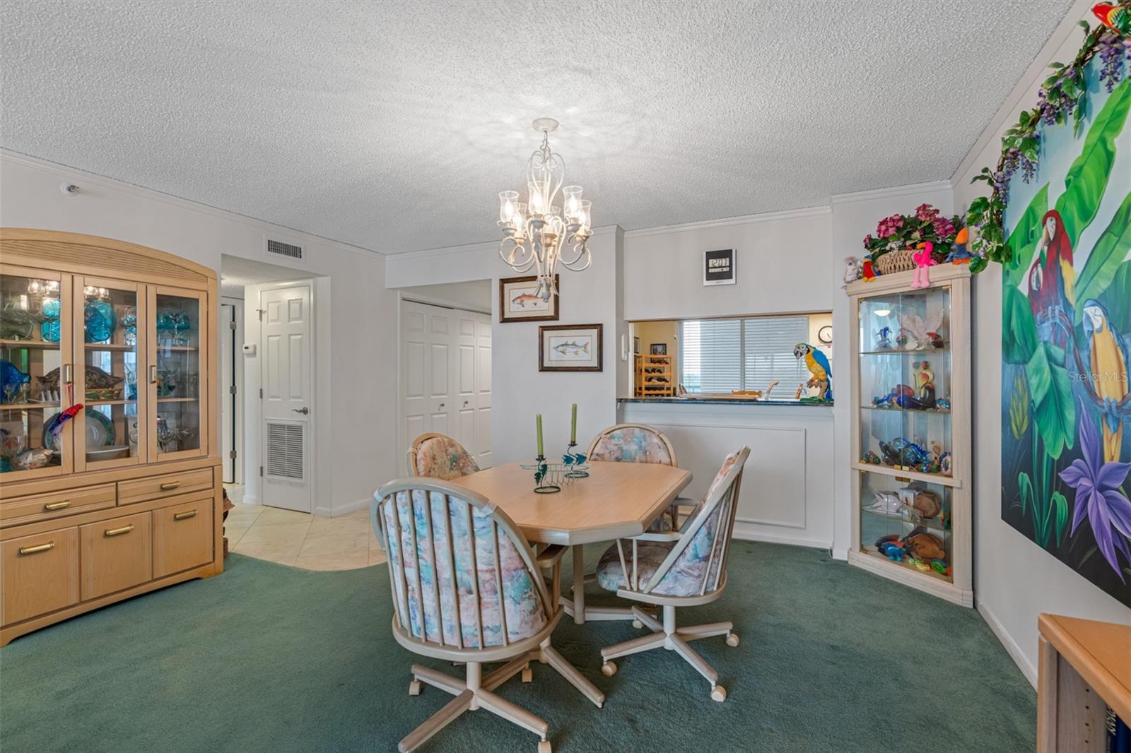 ... Dining Area Off Kitchen.. Present Owners used this Condo as a Comfortable Family Getaway 4 Months a Year. Updated Kitchen - Unit Never Rented. New A/C - New Water Heater - New Balcony Sliders - New Windows -New Storm Shutters.