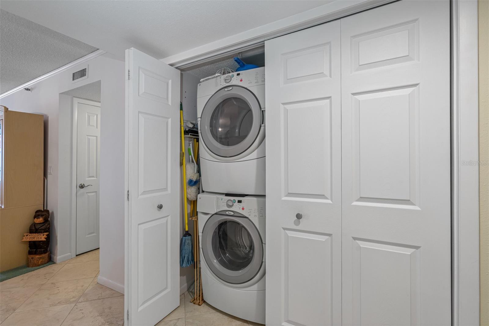 ... Laundry Room Next to Kitchen - Shot # 1........... Washer & Dryer Stays..