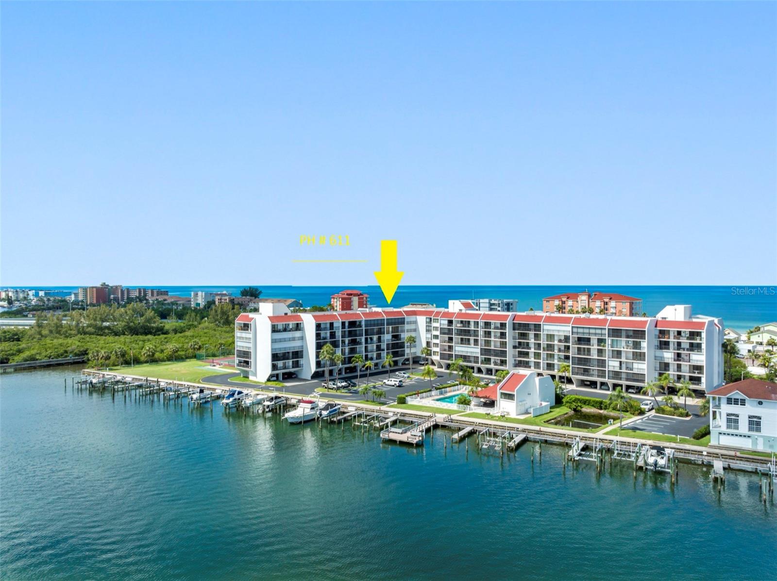 . Top Floor Unit 611 -- Plus - 13x  45 Ft Boat Slip # 11 - Plus - Two Parking Spots - Plus- 6th Floor Storage. ALL NEW PROMENADE WALKWAY & DOCKS BEING INSTALLED RIGHT IN 2025.. BEAUTIFUL...