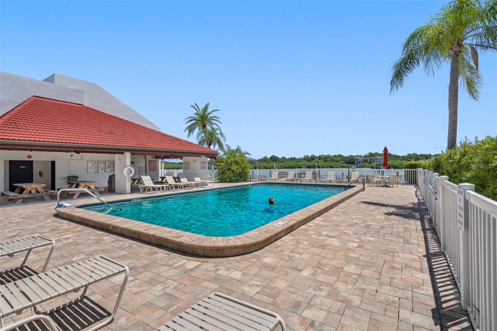 .. Waterfront Heated Pool. Grilling Stations, Day Dock .. Complex Redoing All NEW Docks and walkway as we speak -Large  Boat Slip Value $150,000. Old Lift in place.