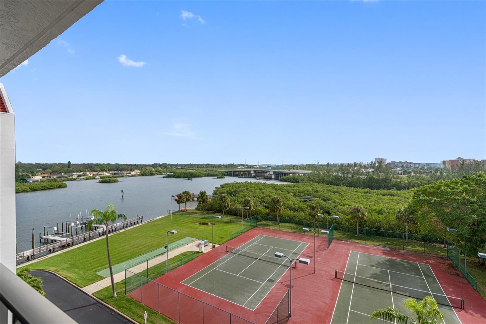 .. View From Unit Front Walkway.. Tennis and Pickle Ball Courts.