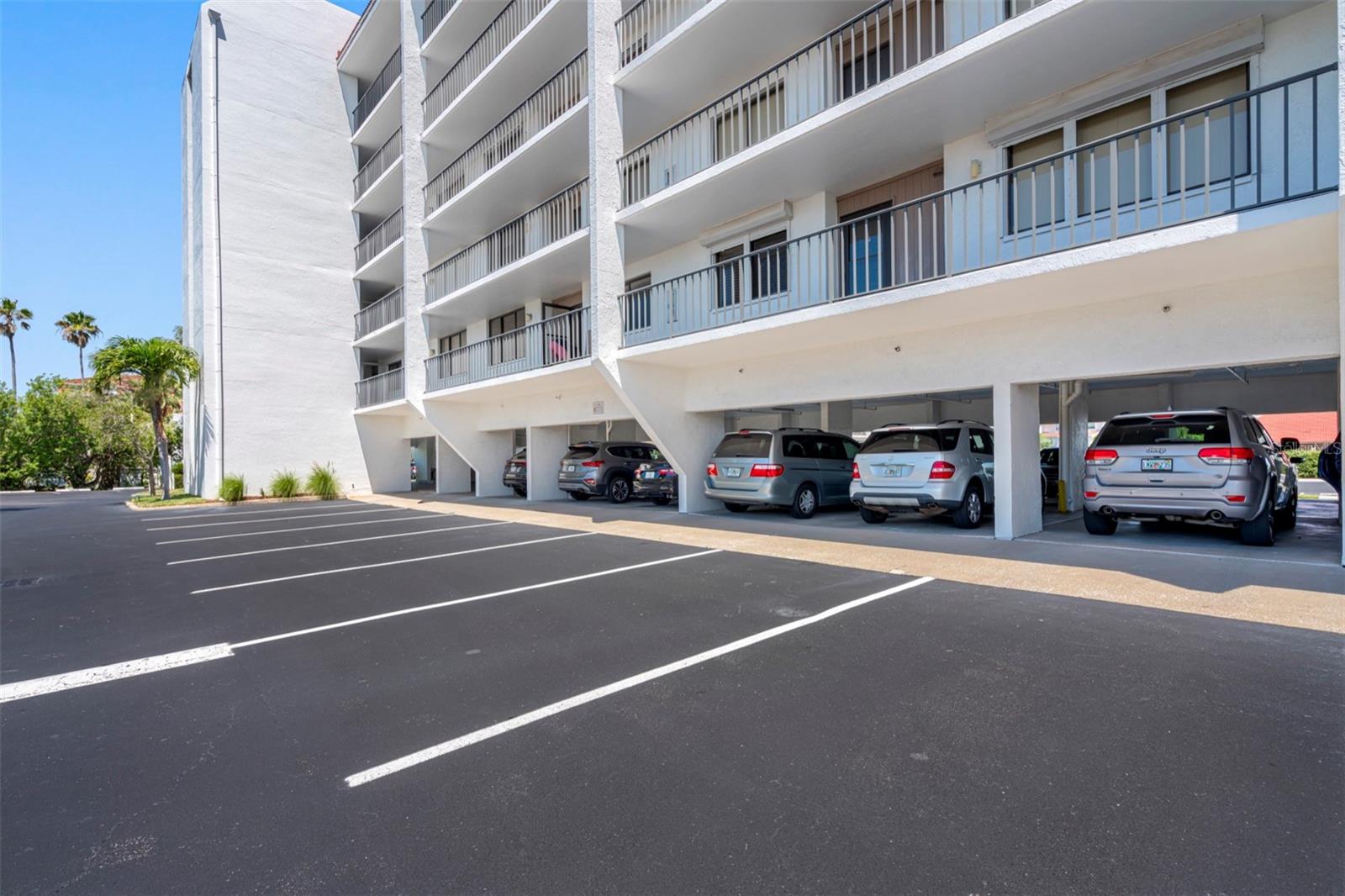 .. Two Parking Spaces ( 80 & 81 ) One Under Building - One Tandem Plus 40 Guest Spots.