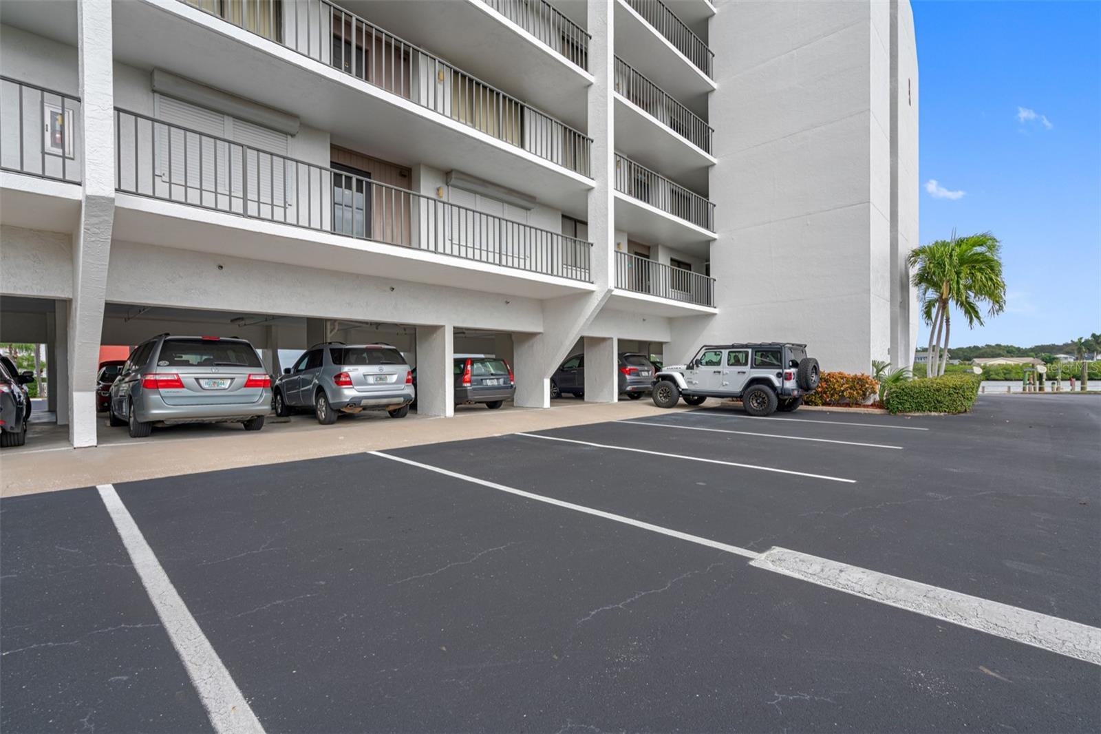 .. Two Parking Spots For Unit 611 - 5 Spots From Lobby Door Next to  Jeep.